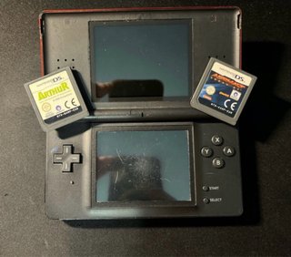 Nintendo Ds lite, caricatore e 2 giochi