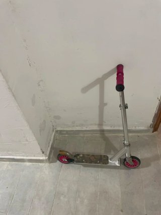 Patinete infantil rosa y plateado