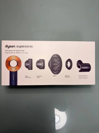 Secador Dyson Azul y Dorado