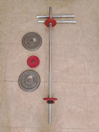 Barra y discos de pesas