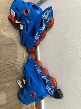 Patines Oxelo Ajustables Talla 30-32 y casco.