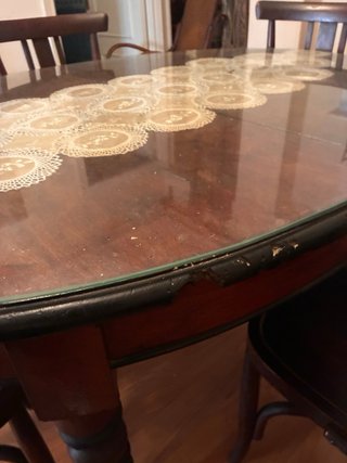 Mesa redonda cristal y 6 sillas madera