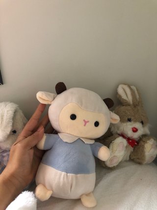 Peluche de perro azul y gato tricolor