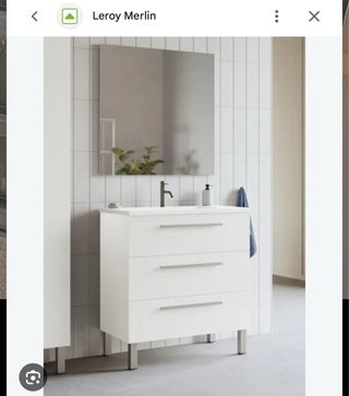 Mueble de baño con lavabo y grifo