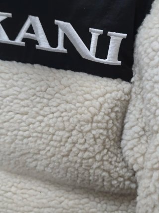 Chaqueta Karl Kani Beige y Negra