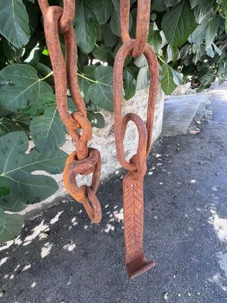 Cadena de chimenea o llar, hierro forjado a mano.