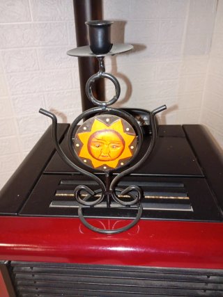 Portacandele con sole decorato