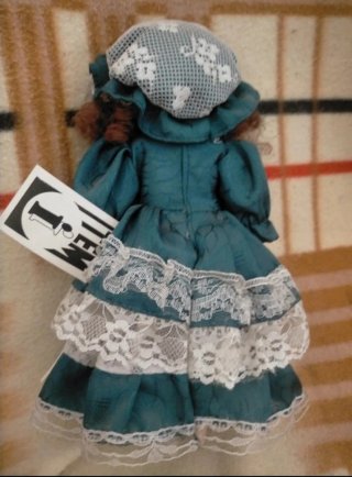 Muñeca de porcelana antigua