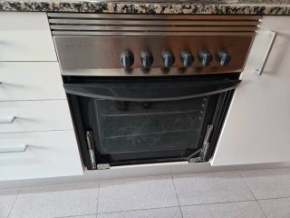 Cocina de gas 4 fuegos + horno