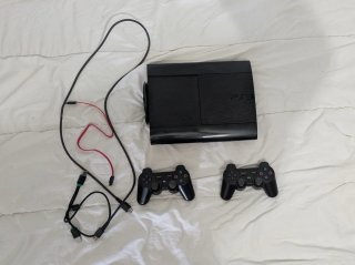 PS3+Mandos+Lote 10 Juegos PS3: Uncharted, COD, GTA