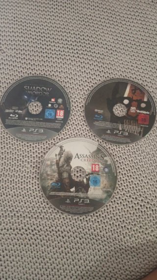 PS3+Mandos+Lote 10 Juegos PS3: Uncharted, COD, GTA