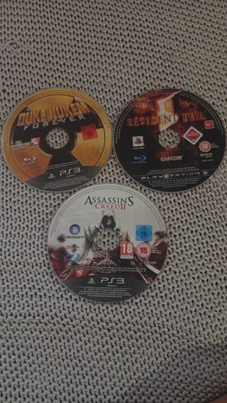 PS3+Mandos+Lote 10 Juegos PS3: Uncharted, COD, GTA