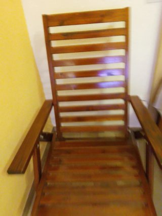 Sillón de jardín con cojín a rayas