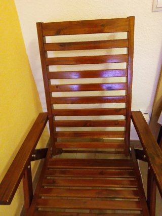 Sillón de jardín con cojín a rayas