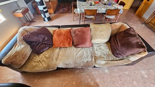 Sofá Roche Bobois Beige y Marrón de piel y pluma.