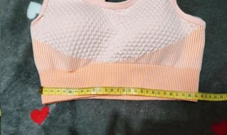 Top deportivo cruzado naranja y rosa