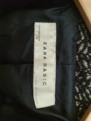 Abrigo de paño gris y negro