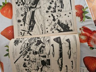 3 cómics; zona de combate.