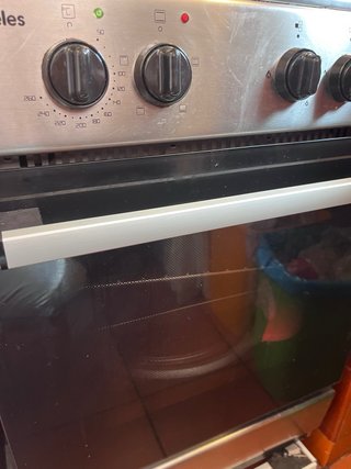 Nevera Smeg y cocina con horno