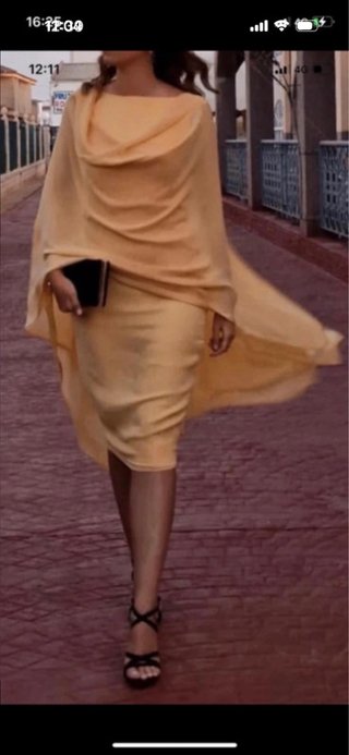 Vestido amarillo hecho a mano equivale a una S