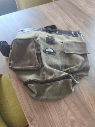 Mochila El Corte Inglés verde y marrón