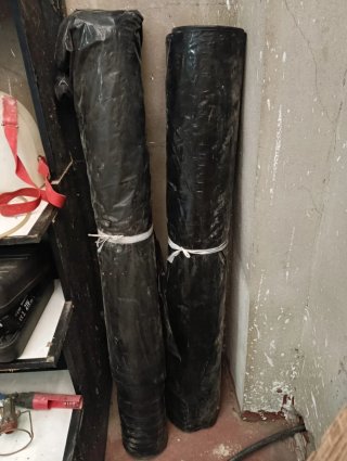Manguera de riego enrollada