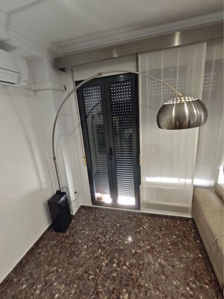 Lampada ad arco con base in marmo stile Flos