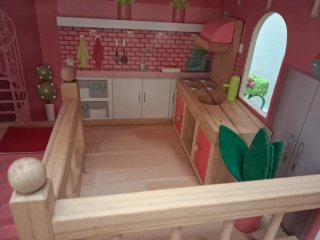 Casa de muñecas rosa de 3 pisos