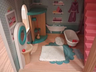 Casa de muñecas rosa de 3 pisos