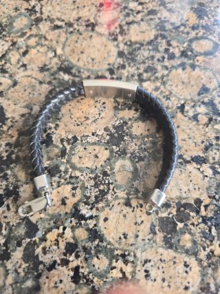 Pulsera Lotus Cuero Trenzado Negra