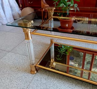 Mesa de centro cristal y metal dorado