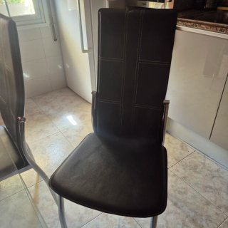 Mesa de cristal con 4 sillas