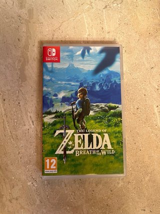 Nintendo Switch OLED + Zelda Breath of the Wild