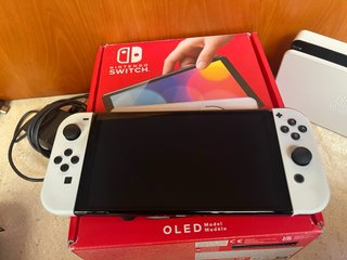 Nintendo Switch OLED + Zelda Breath of the Wild