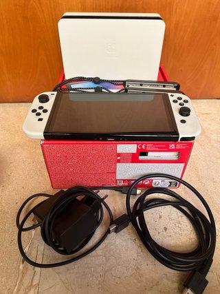 Nintendo Switch OLED + Zelda Breath of the Wild