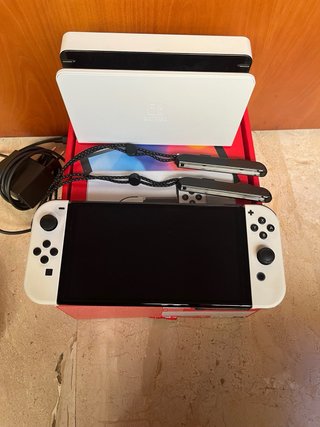 Nintendo Switch OLED + Zelda Breath of the Wild