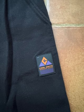 Pantalón chándal negro con bolsillos