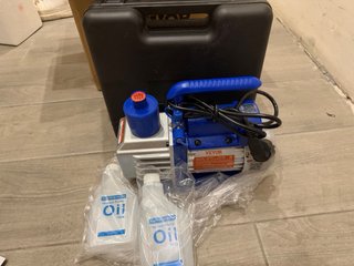 Bomba de vacío A/A nueva con manometros