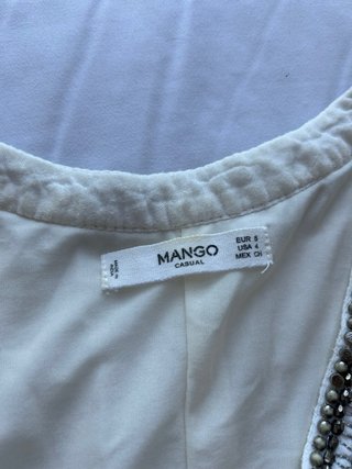 Vestido de verano blanco con abalorios
