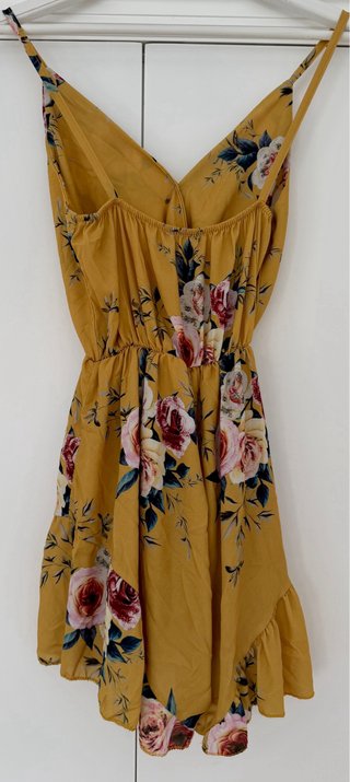 Mono corto flores amarillo tipo vestido falda pant
