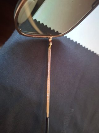Gafas de sol Emporio Armani doradas y negras