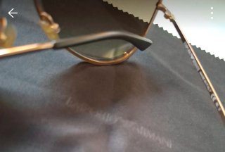 Gafas de sol Emporio Armani doradas y negras