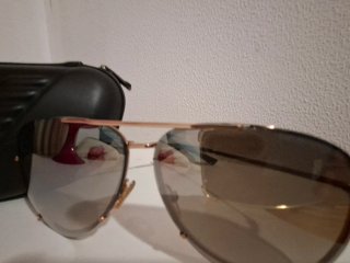 Gafas de sol Emporio Armani doradas y negras