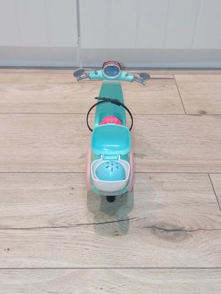 Moto Barbie rosa y turquesa