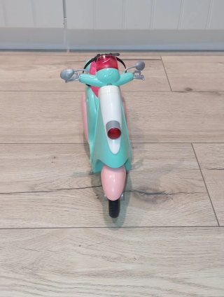 Moto Barbie rosa y turquesa