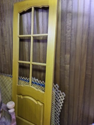 Puerta de madera maciza con cristal