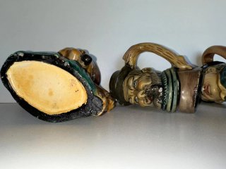 Jarras antiguas con forma de cabeza