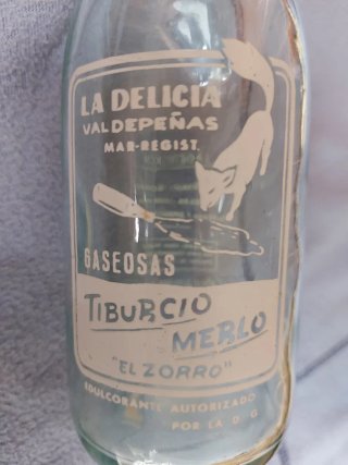 Botella antigua La Delicia Tiburcio Merlo