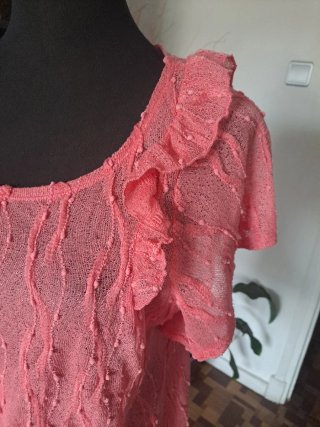 Camisa rosa manga corta con volantes