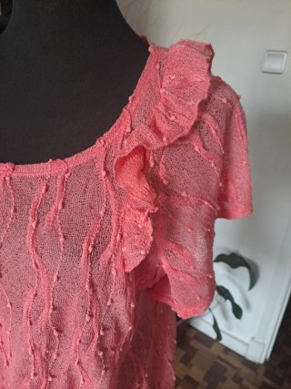 Camisa rosa manga corta con volantes